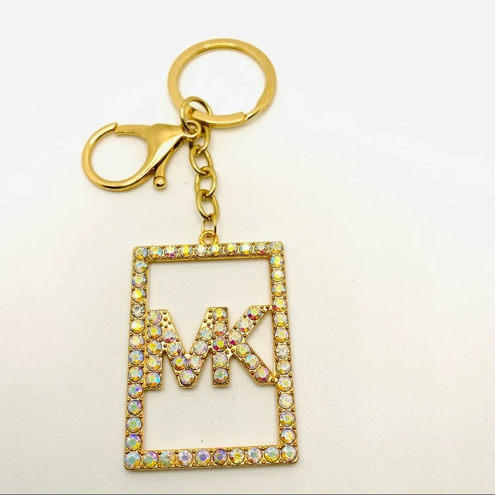 Purse Charm Key Chain MK in Iridescent Crystals set in golden tone. BRAND NEW